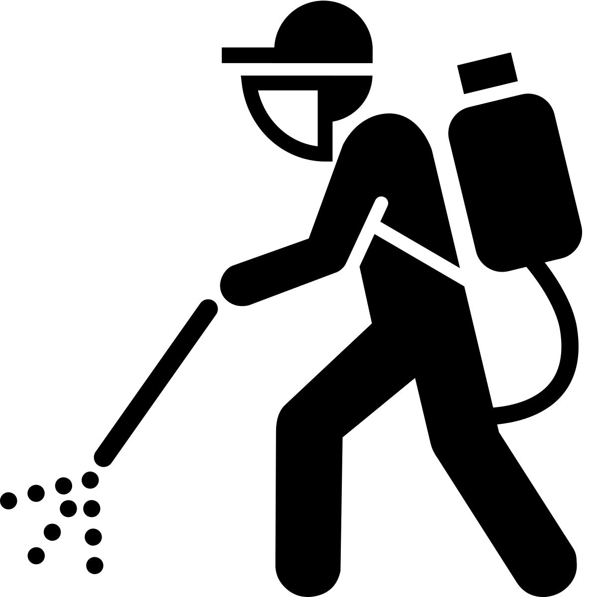 Technician spraying for pests
